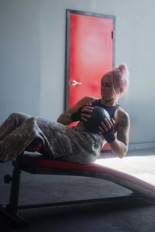 woman doing lower ab exercise